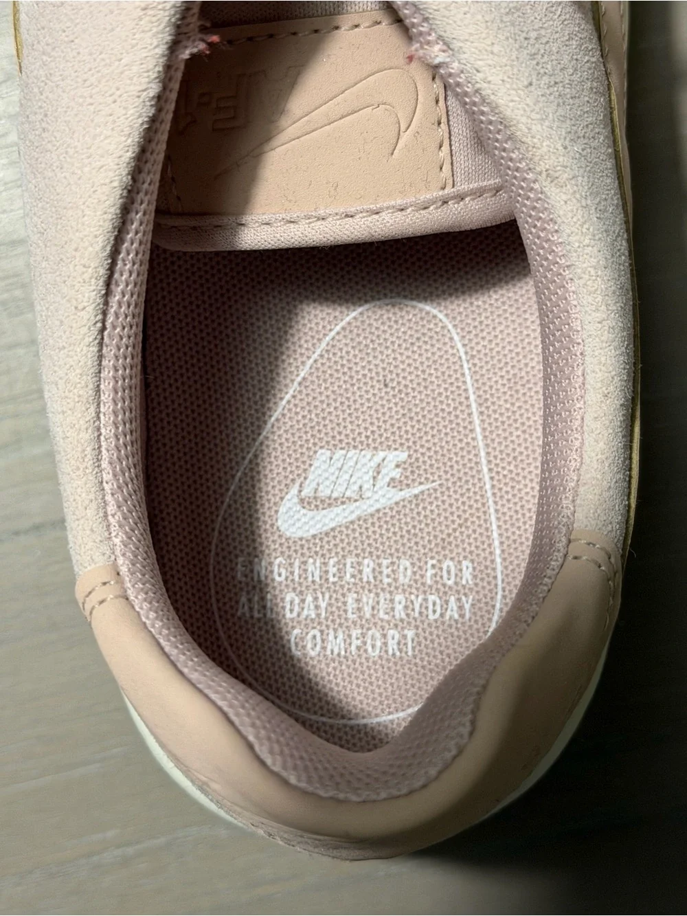 Nike Women’s Light Pink Suede Platform Sneakers